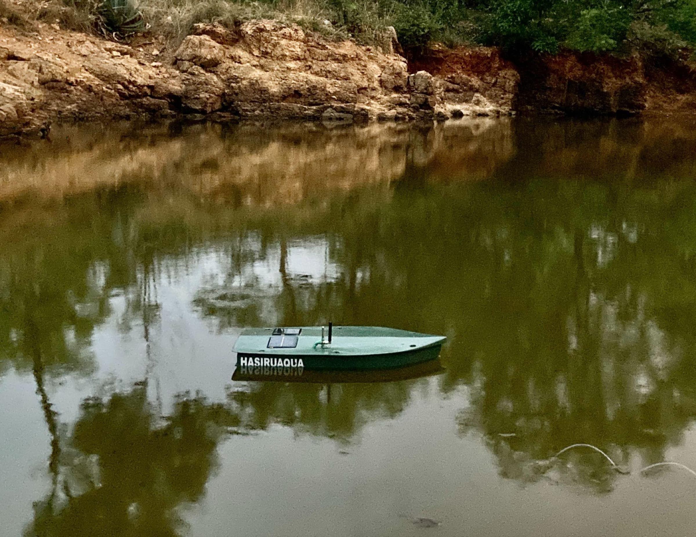A MeenDoctru sensor floating on a HasiruAqua fish pond, solar-powered